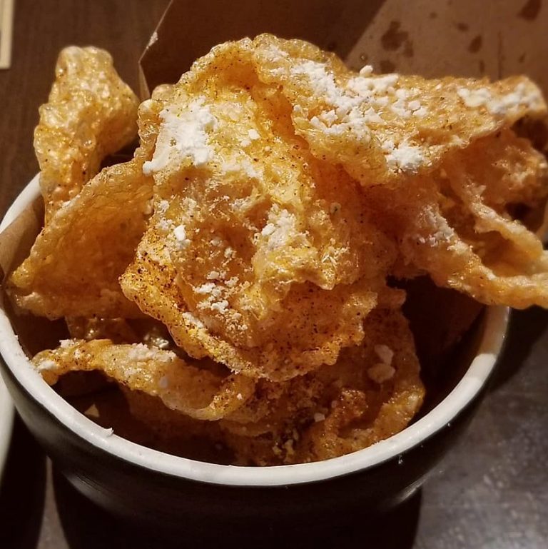 The fresh pork rinds sprinkled with cheese dust were the highlight of this expensive…